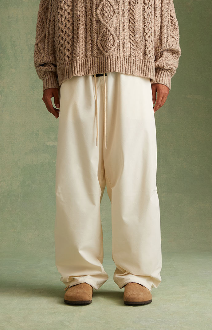 Fear of God Essentials Cloud Dancer Relaxed Trousers | PacSun