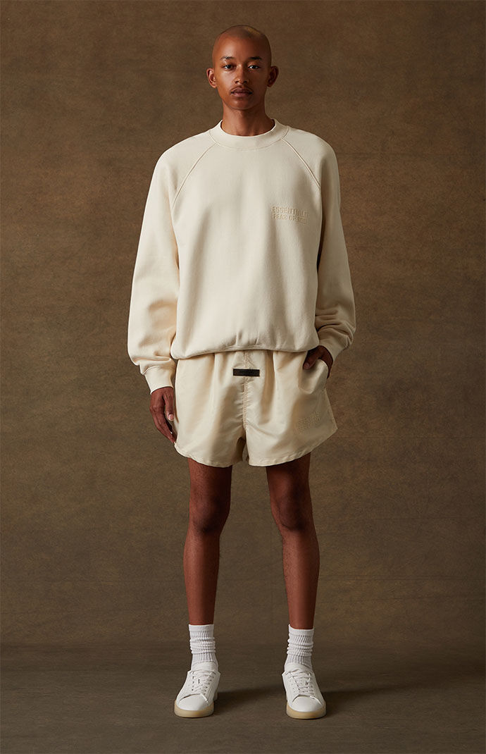 Fear of God Essentials Egg Shell Running Shorts PacSun