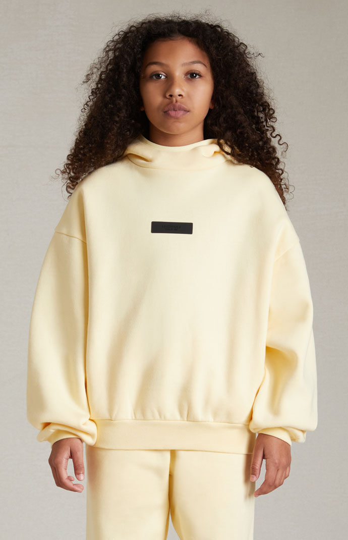 Yellow essentials store hoodie