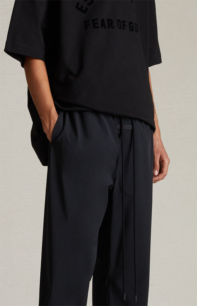 Fear of God Essentials Jet Black Nylon Track Pants | PacSun Fear of God Essentials Jet Black Nylon Track Pants | PacSun