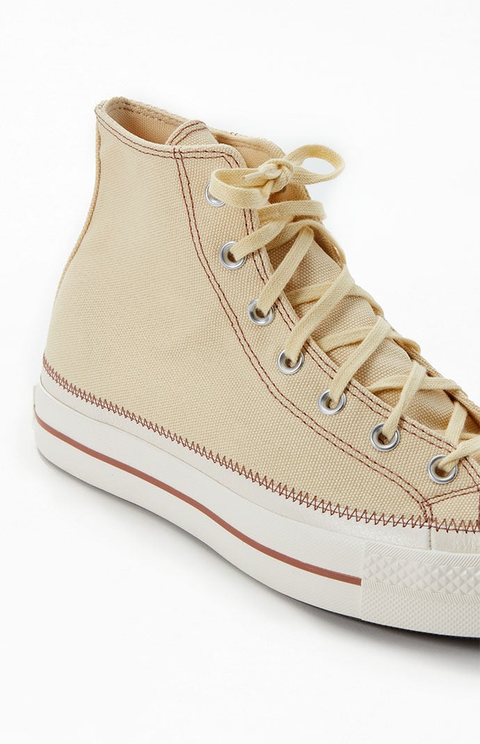 Cream high clearance top sneakers