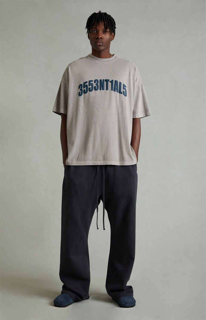 Fear of God ESSENTIALS Vintage Black Fleece Flare Sweatpants | Pacsun