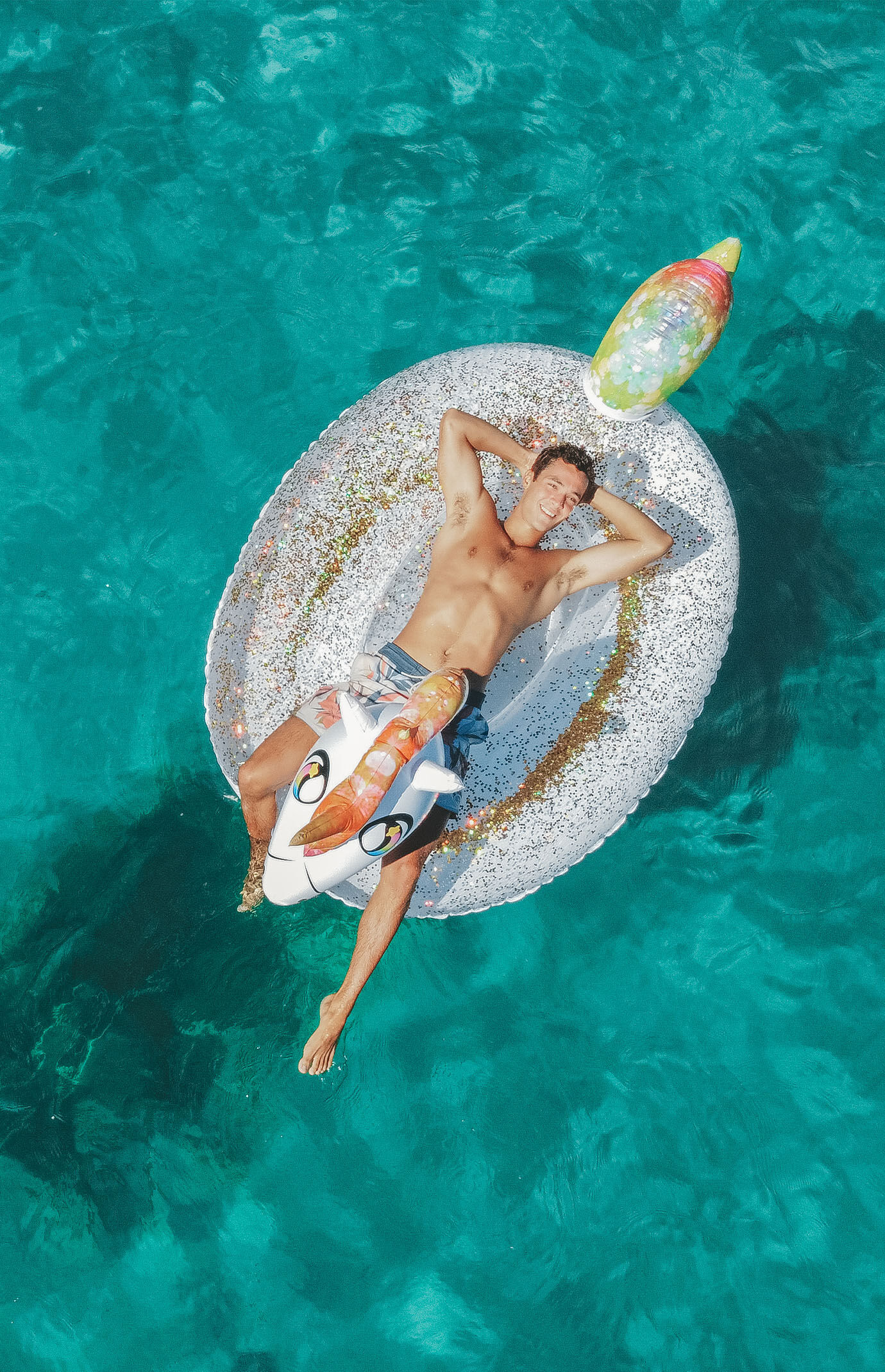 PoolCandy Gigantic Rainbow Glitter Unicorn Pool Raft