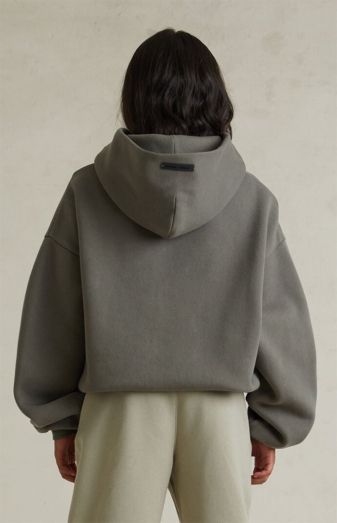 Fear of God ESSENTIALS Kids Moss '90s Fit Fleece Hoodie | Pacsun