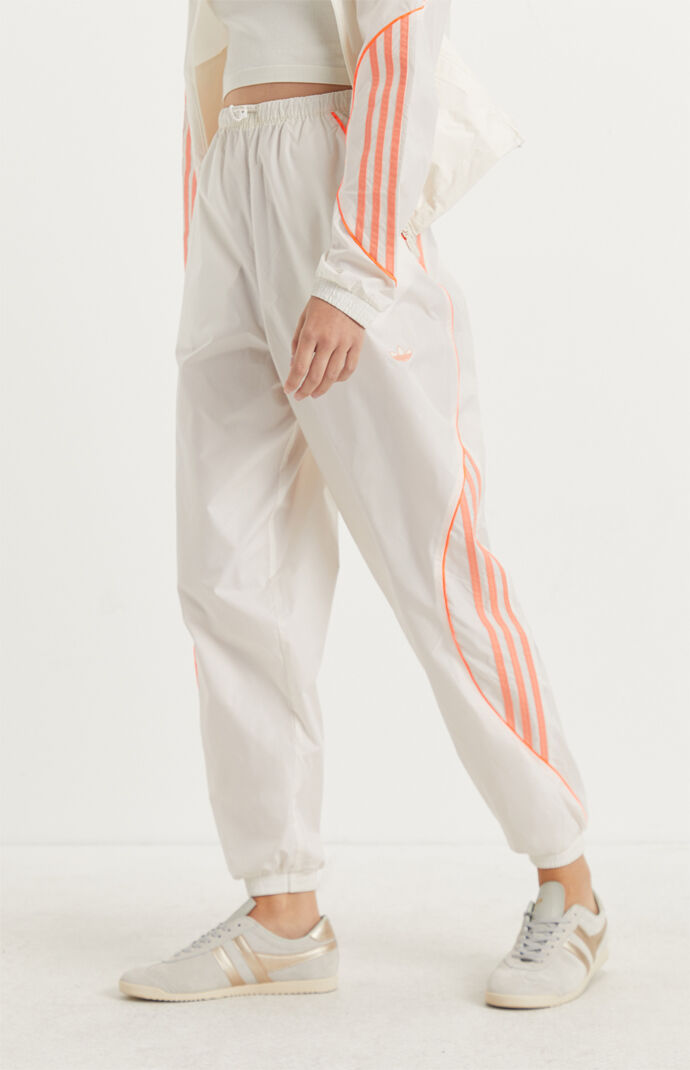 white adidas track pants