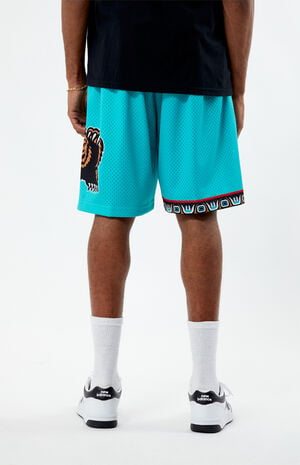 Men's Mitchell & Ness Cream Vancouver Grizzlies Chainstitched Swingman Shorts