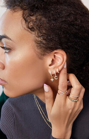 Celeste Crescent Moon Huggie Hoop Earrings image number 4