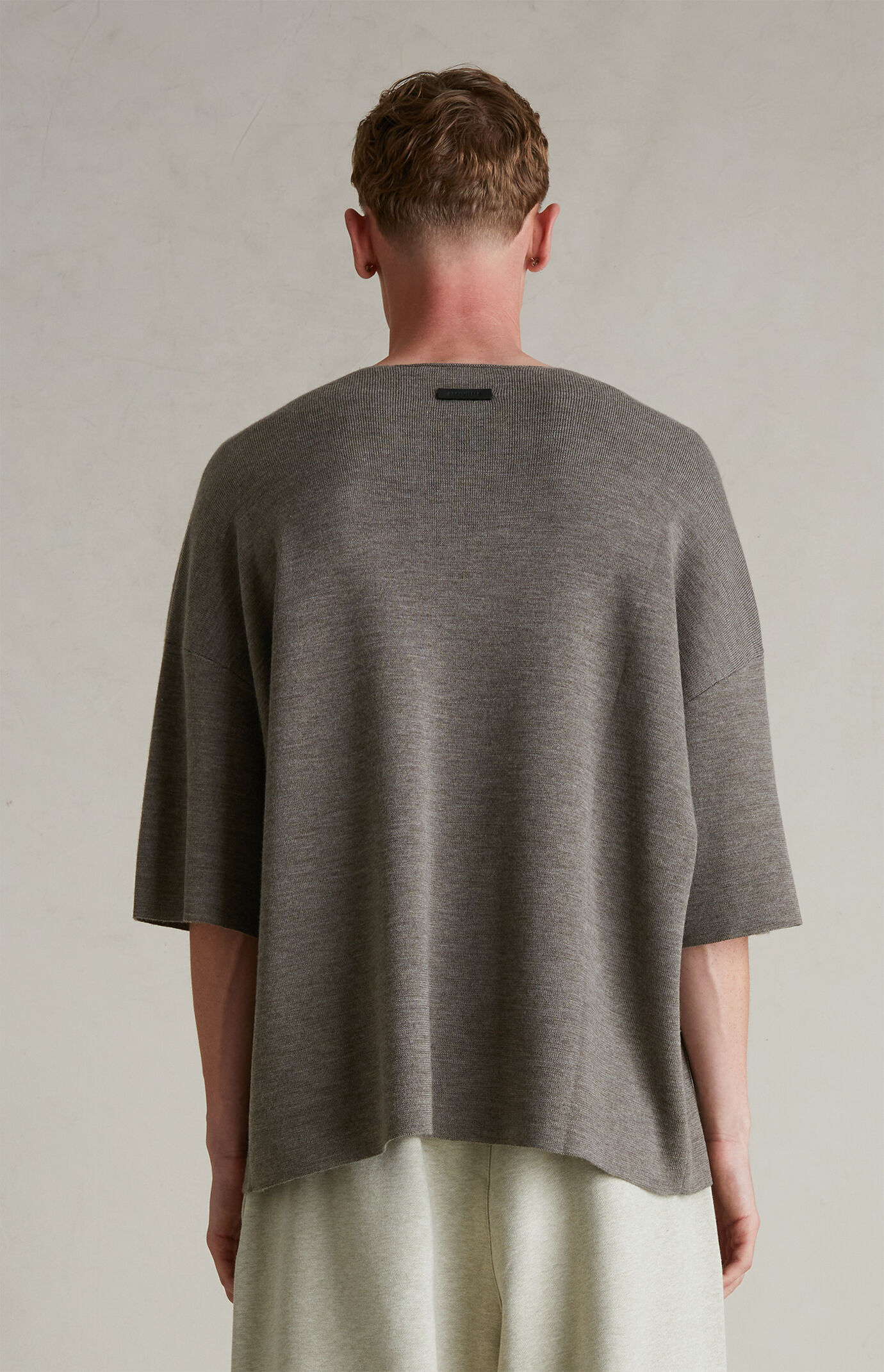 【FEAR OF GOD】ESSENTIALS MERINO SHORT SLEEVE SWEATER FG24FW20-
