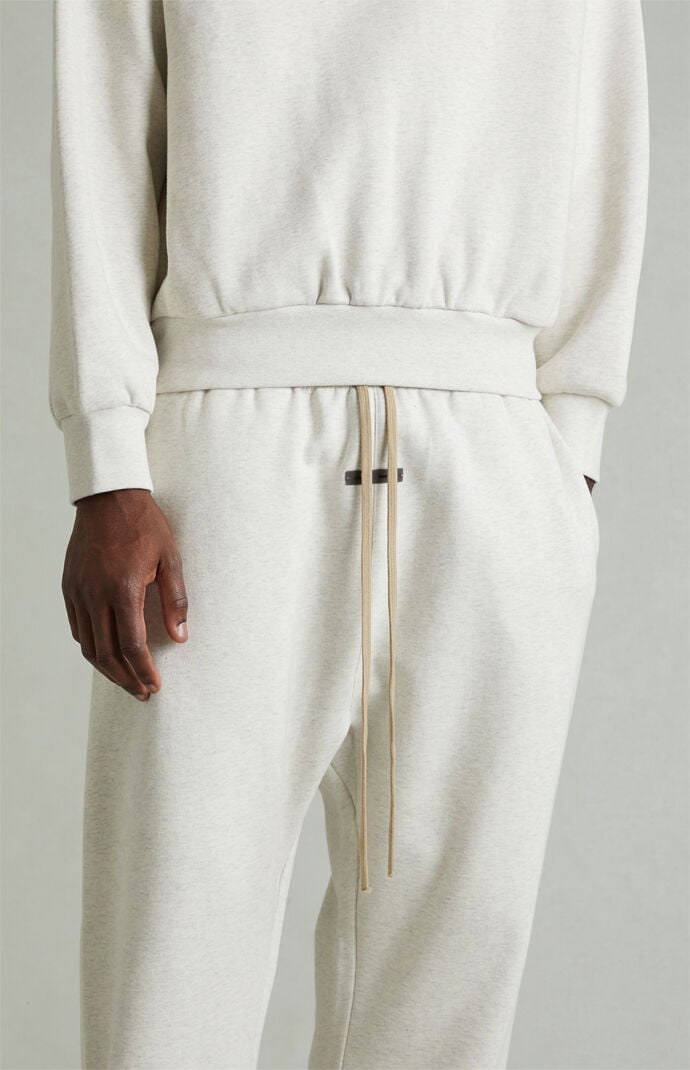 Fear of God ESSENTIALS Heather Oatmeal Fleece Flare Sweatpants