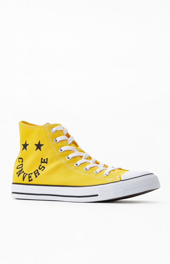 yellow chuck taylors