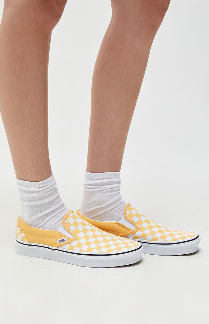 orange checkered slip on vans