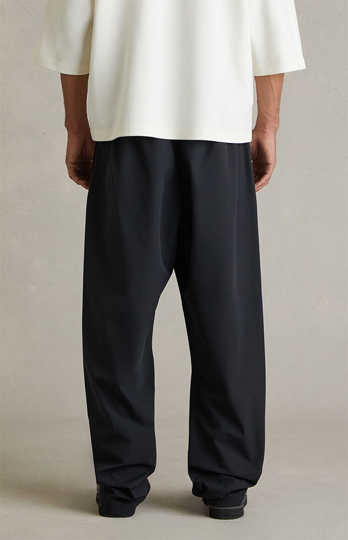 Fear of God ESSENTIALS Vintage Black Signature Track Pants | Pacsun