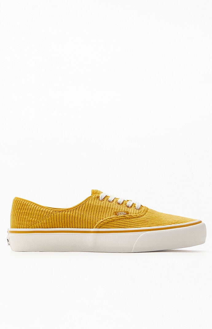 solid yellow vans slip on