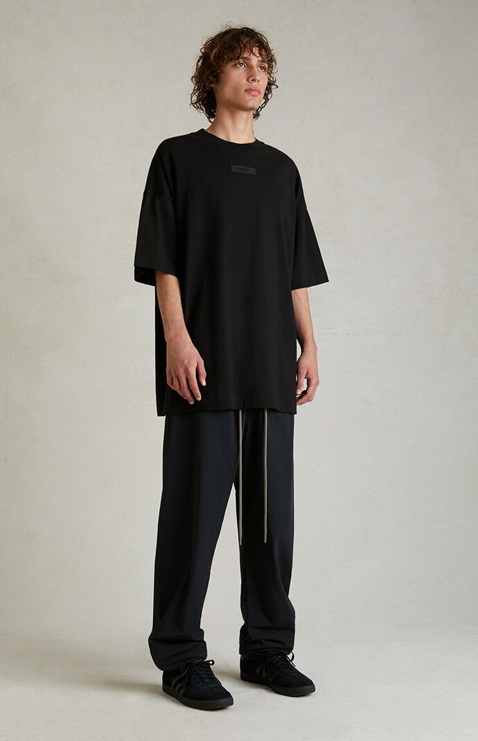 Fear of God Essentials Black Nylon Track Pants | PacSun