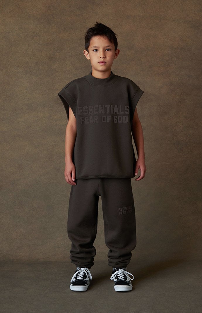 Kids Fear of God Essentials Off Black Sleeveless Sweatshirt PacSun