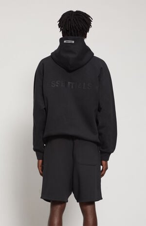 fear of god essentials black zip hoodie