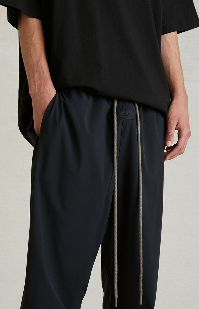 Fear of God Essentials Black Nylon Track Pants | PacSun