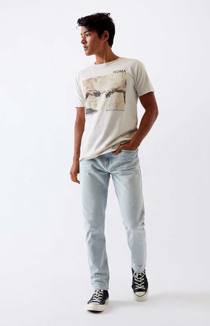 Light Ripped Slim Taper Jeans