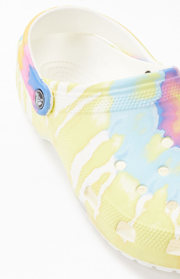 white and blue tie dye crocs