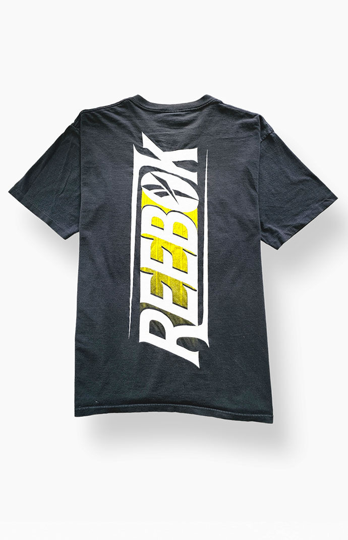 Black and yellow reebok shirt sales
