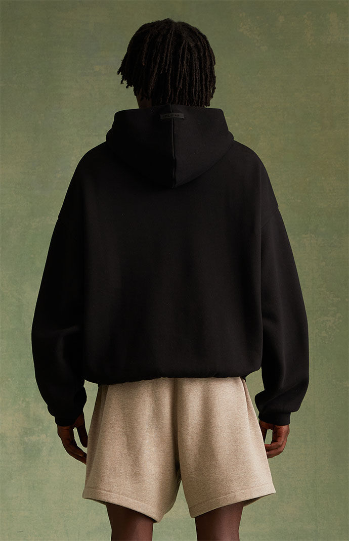 Fear of God Essentials Jet Black Hoodie PacSun