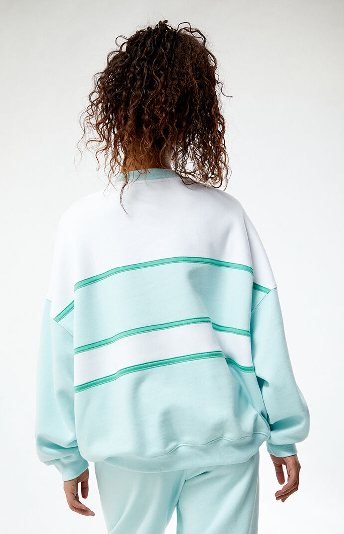 激レア　新品　Barbie バービー　スウェット　トレーナー　ライトブルー　水色 Barbie Malibu LA Sports Club Crew Neck Sweatshirt | Pacsun