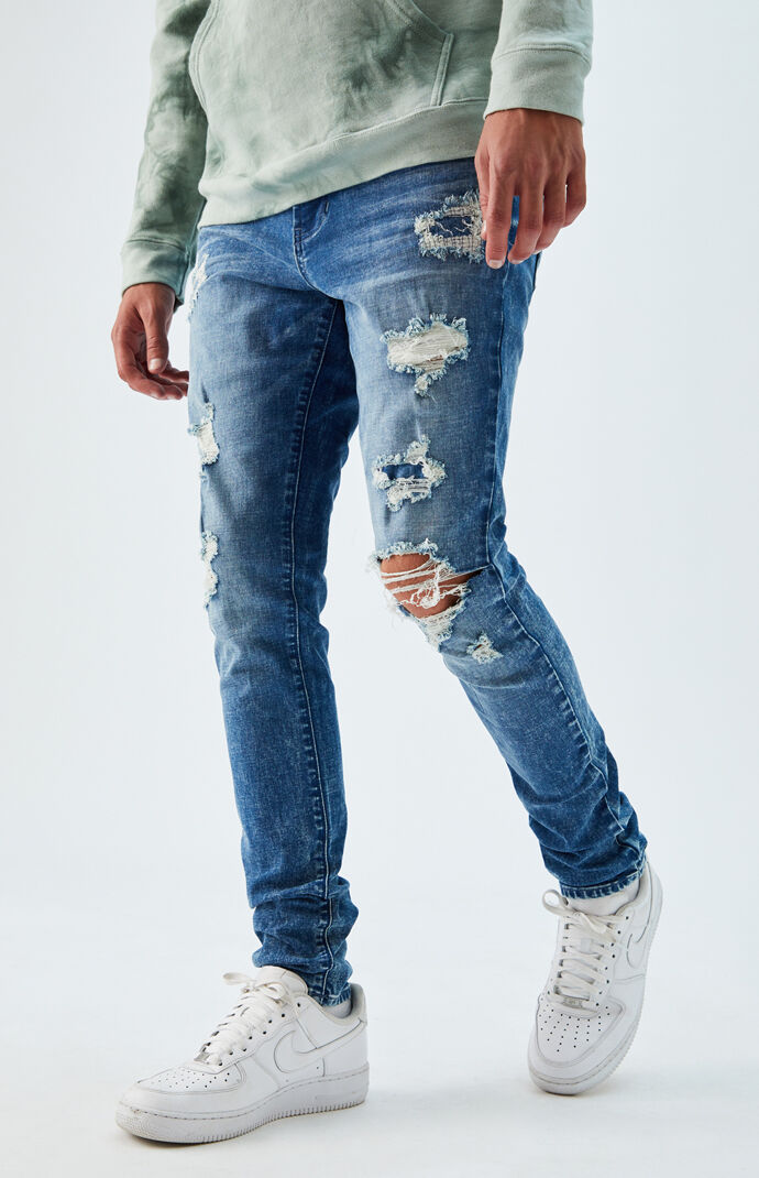 ripped stacked skinny jeans