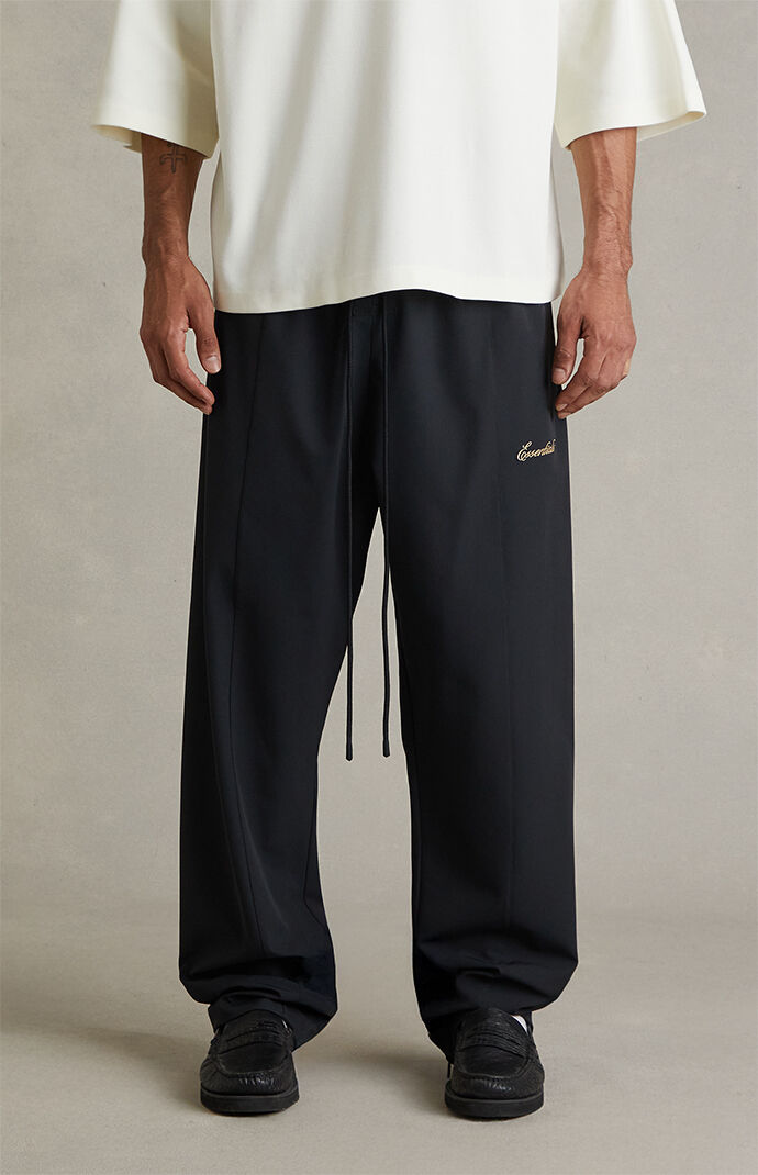 Fear of God ESSENTIALS Vintage Black Signature Track Pants | Pacsun