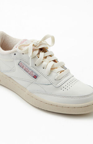 Classic Style with a Twist: Reebok White and Pink Club C 85