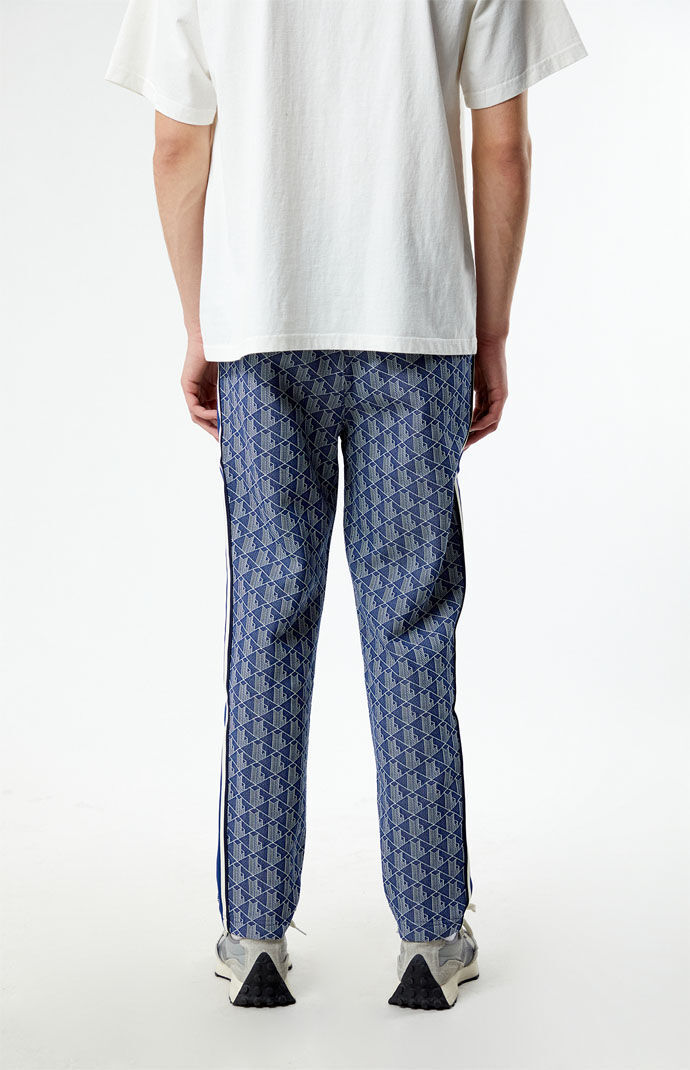 Lacoste【日常使いからスポーツに☆Monogram Print Trackpants】 Lacoste Monogram Print Track Pants | PacSun