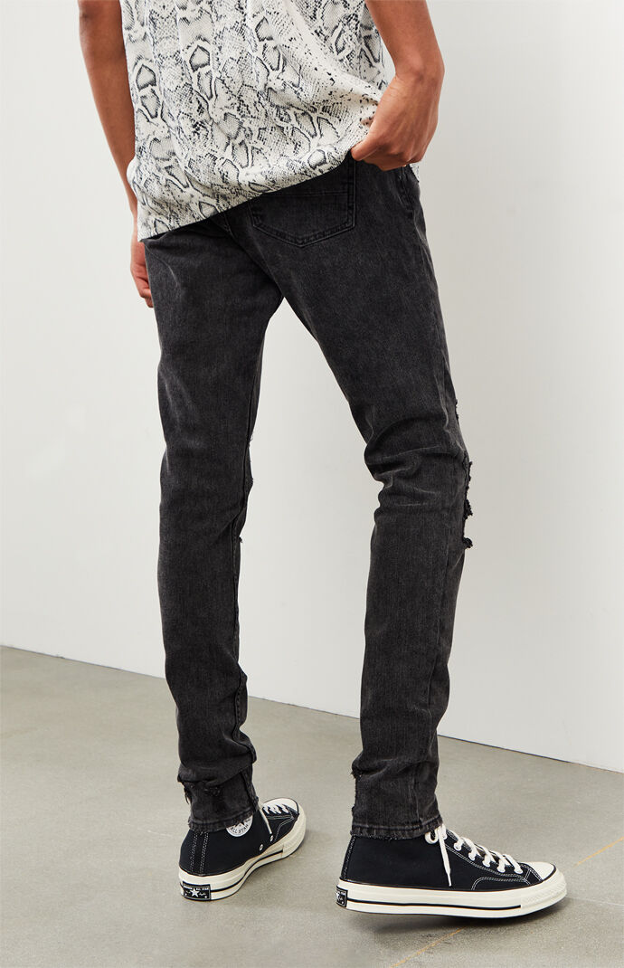 Black ripped stacked skinny jeans from PacSun