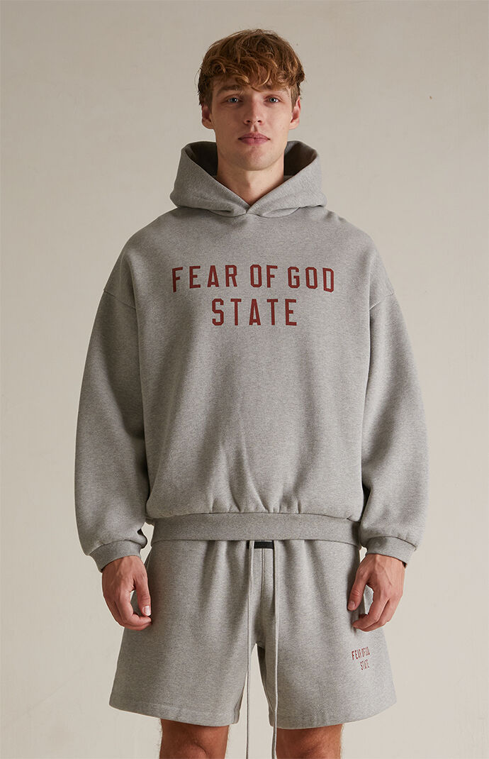 Fear of God ESSENTIALS Dark Heather Oatmeal Fleece Hoodie | PacSun