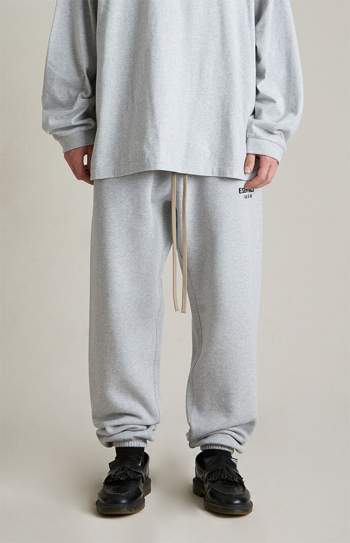 Fear of God ESSENTIALS Light Heather Grey Fleece Sweatpants | Pacsun