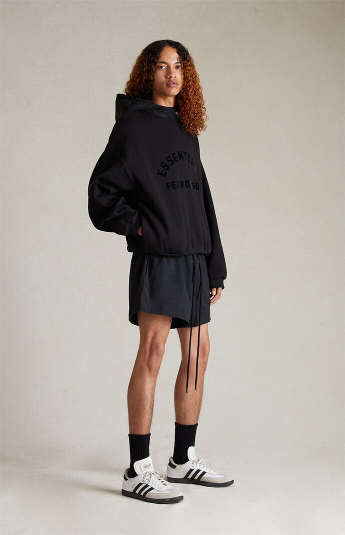 Fear of God Essentials Jet Black Nylon Fleece Hoodie | PacSun