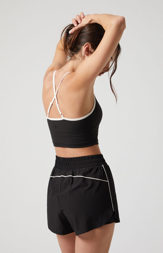 PAC 1980 Active Black Piping Dolphin Hem Track Shorts | PacSun