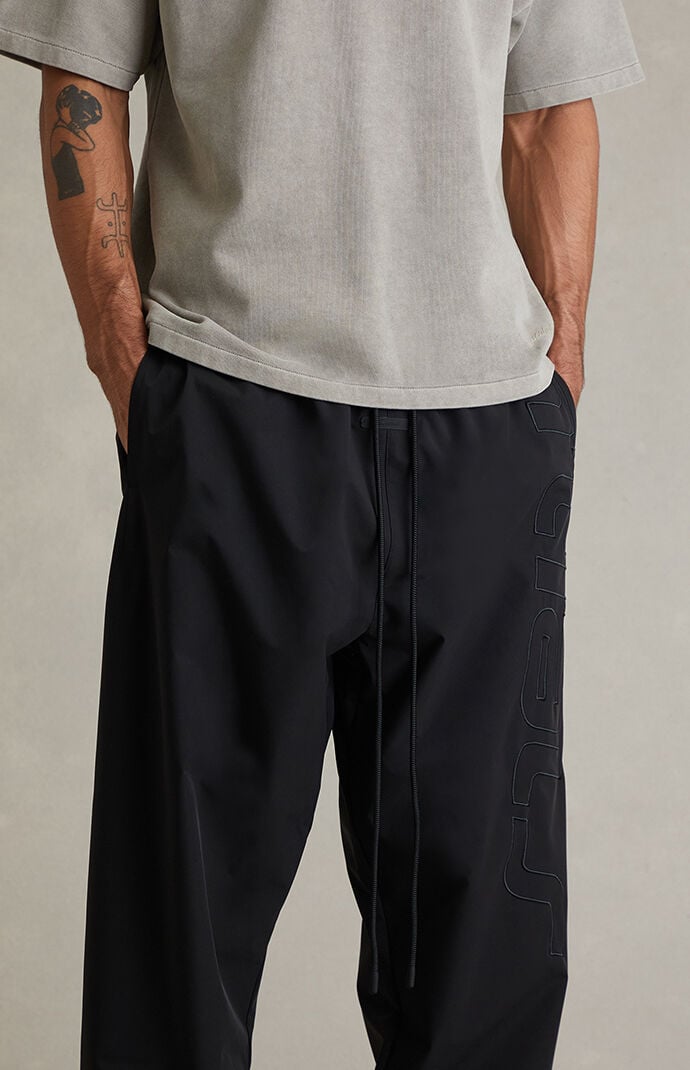 Fear of God ESSENTIALS Vintage Black Active Trace Baggy Track Pants