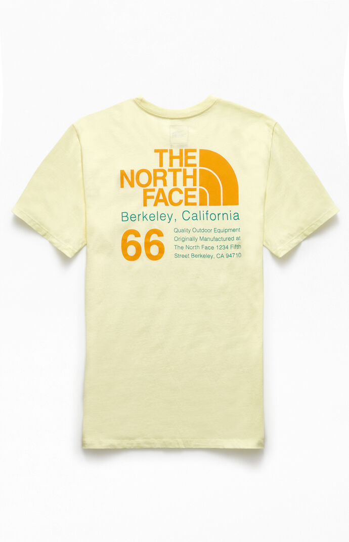 yellow north face shirt