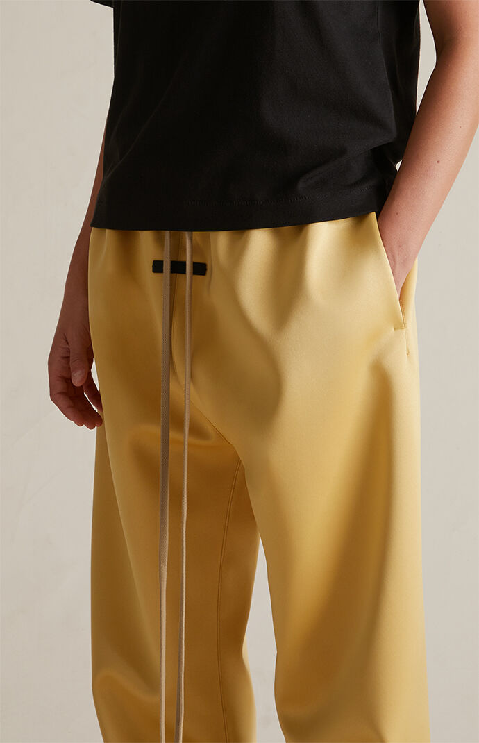 【FOG Essentials】 Women's Amber Satin Sweatpants Fear of God Essentials Women's Amber Satin Sweatpants | PacSun