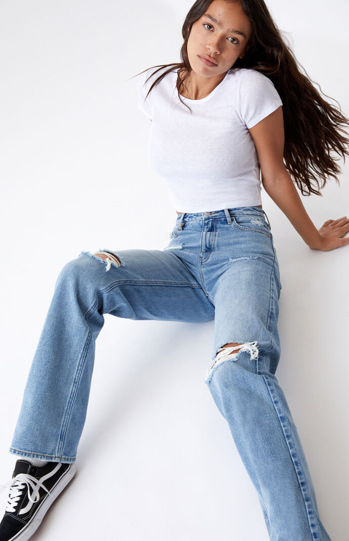 light blue ripped baggy jeans