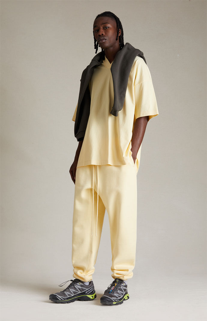 Fear of God Essentials Garden Yellow Sweatpants PacSun