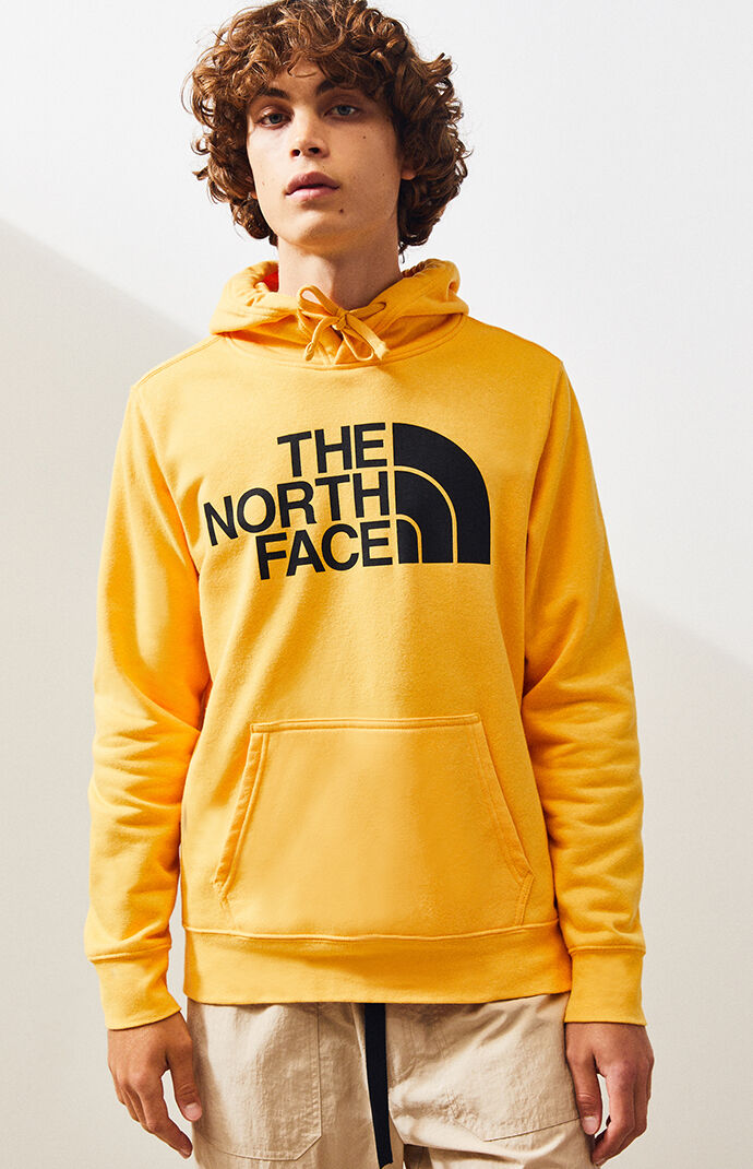 yellow north face jumper