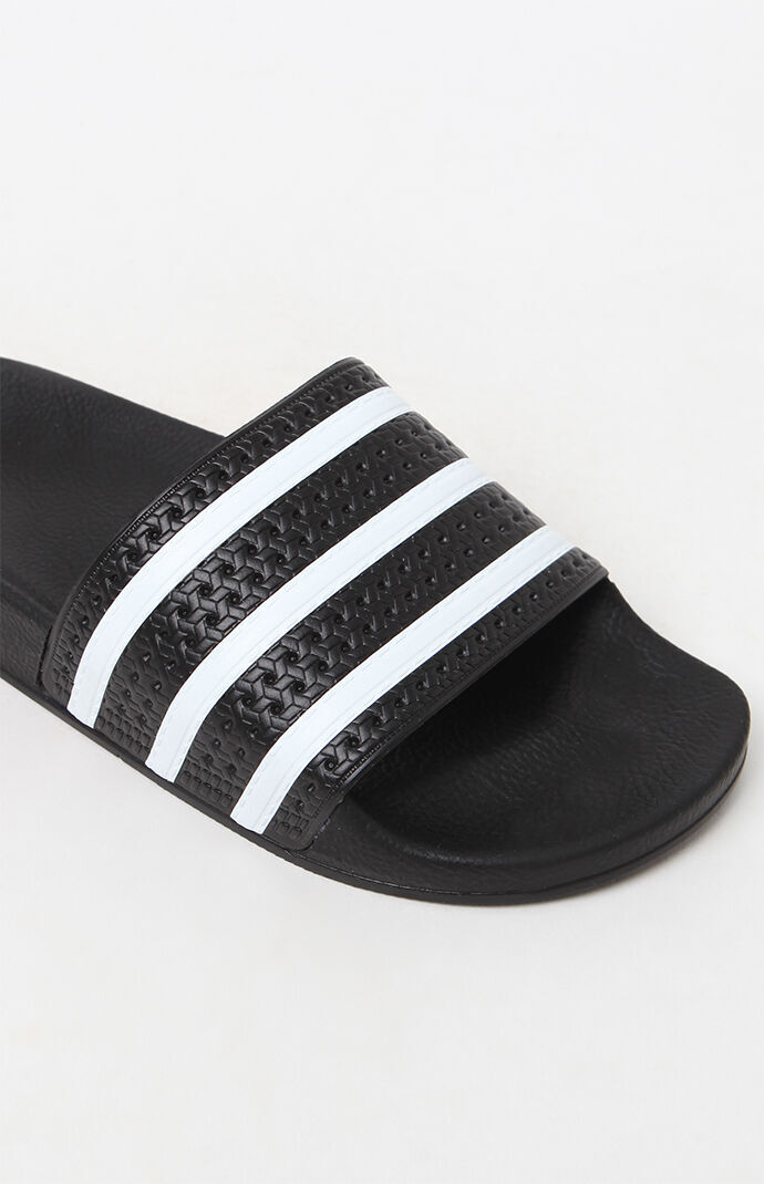 all black adilette slides