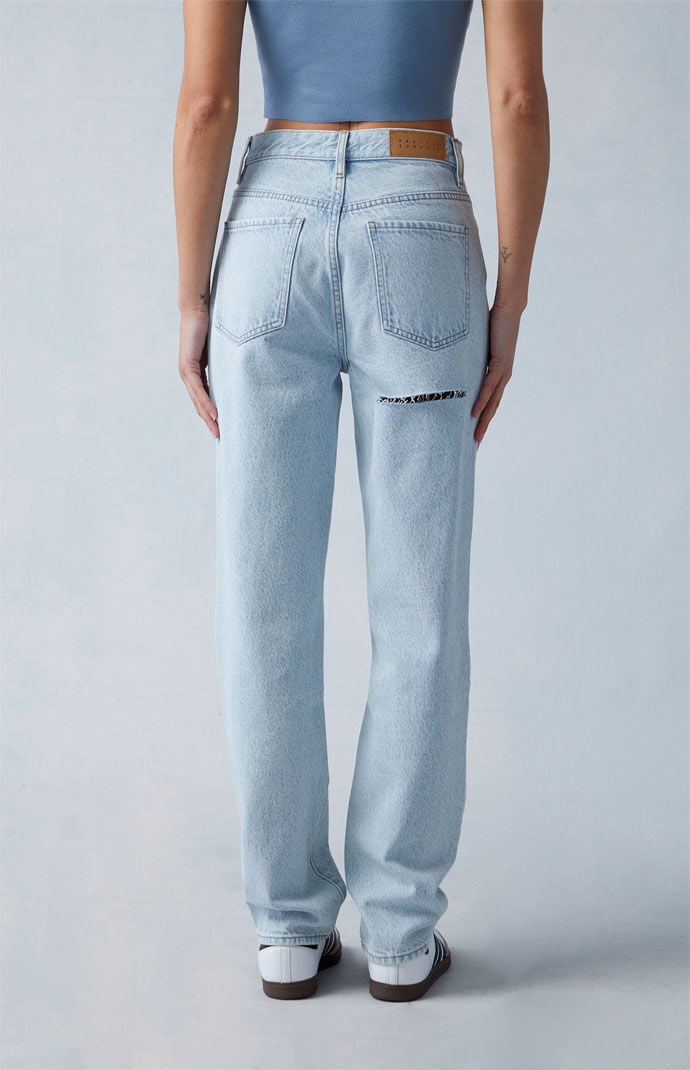 Jeans with slits under bum top