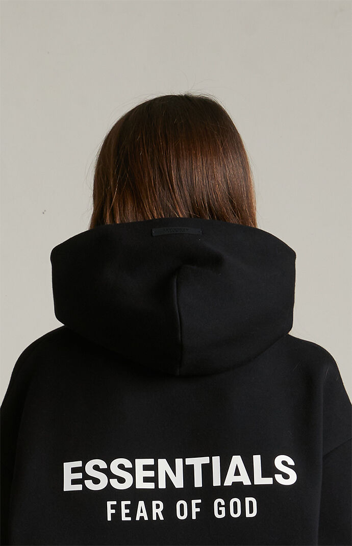 Fear of God Essentials Kids Black Fleece Hoodie | Pacsun