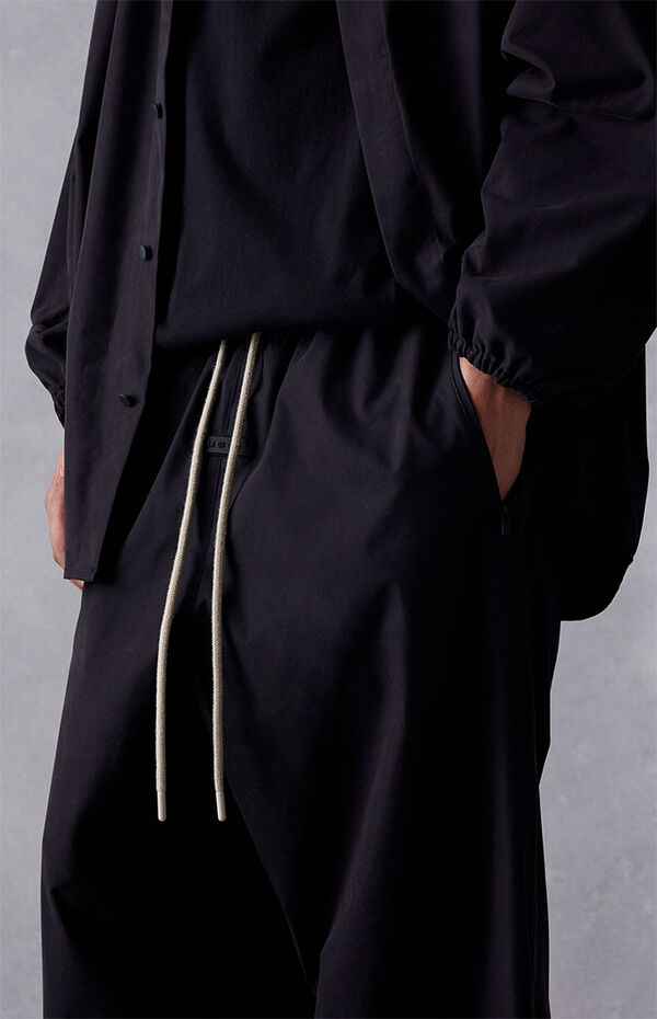 Fear of God Essentials Jet Black Relaxed Trousers | PacSun