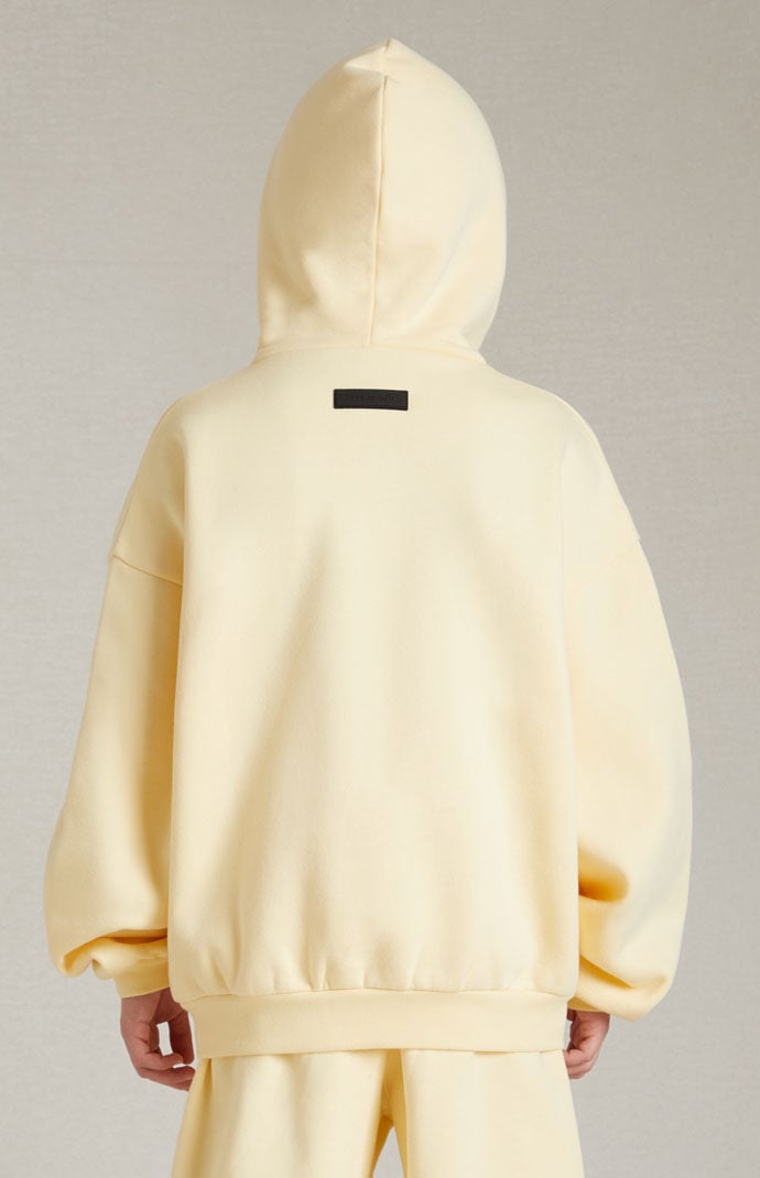 Kids Fear of God Essentials Garden Yellow Hoodie PacSun