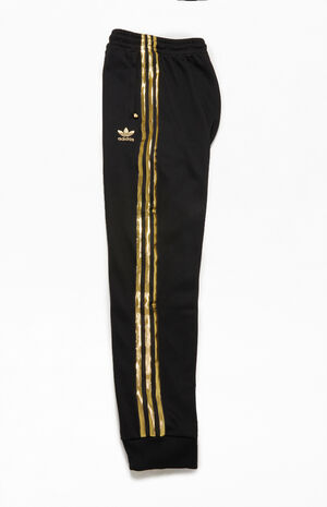 victory oasis Moronic adidas Superstar 24K Track Pants | PacSun