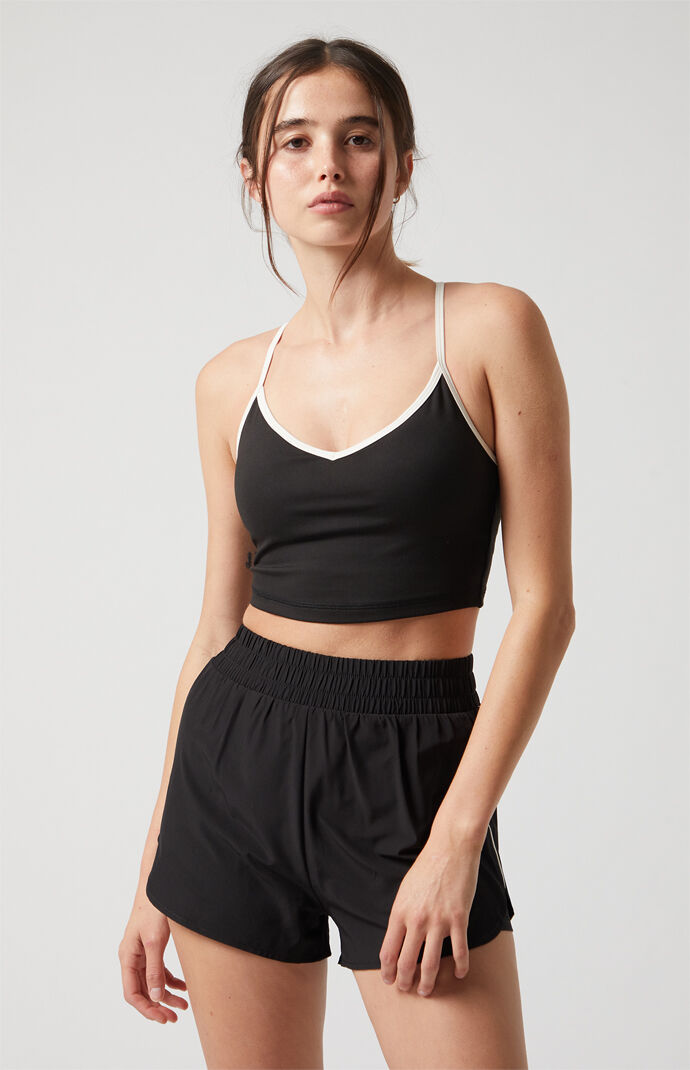 PAC 1980 Active Black Piping Dolphin Hem Track Shorts | PacSun