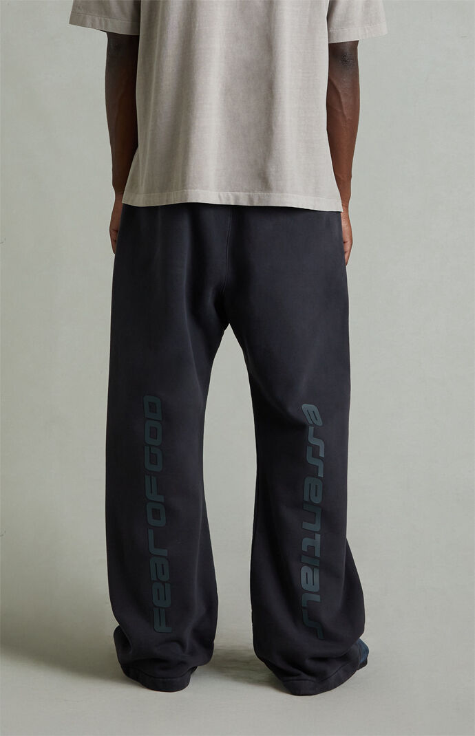 Fear of God ESSENTIALS Vintage Black Fleece Flare Sweatpants | Pacsun