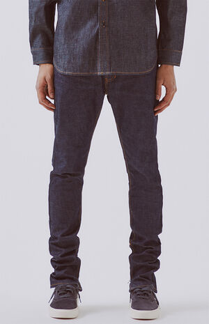 Essentials Raw Indigo Skinny Taper Jeans image number 1